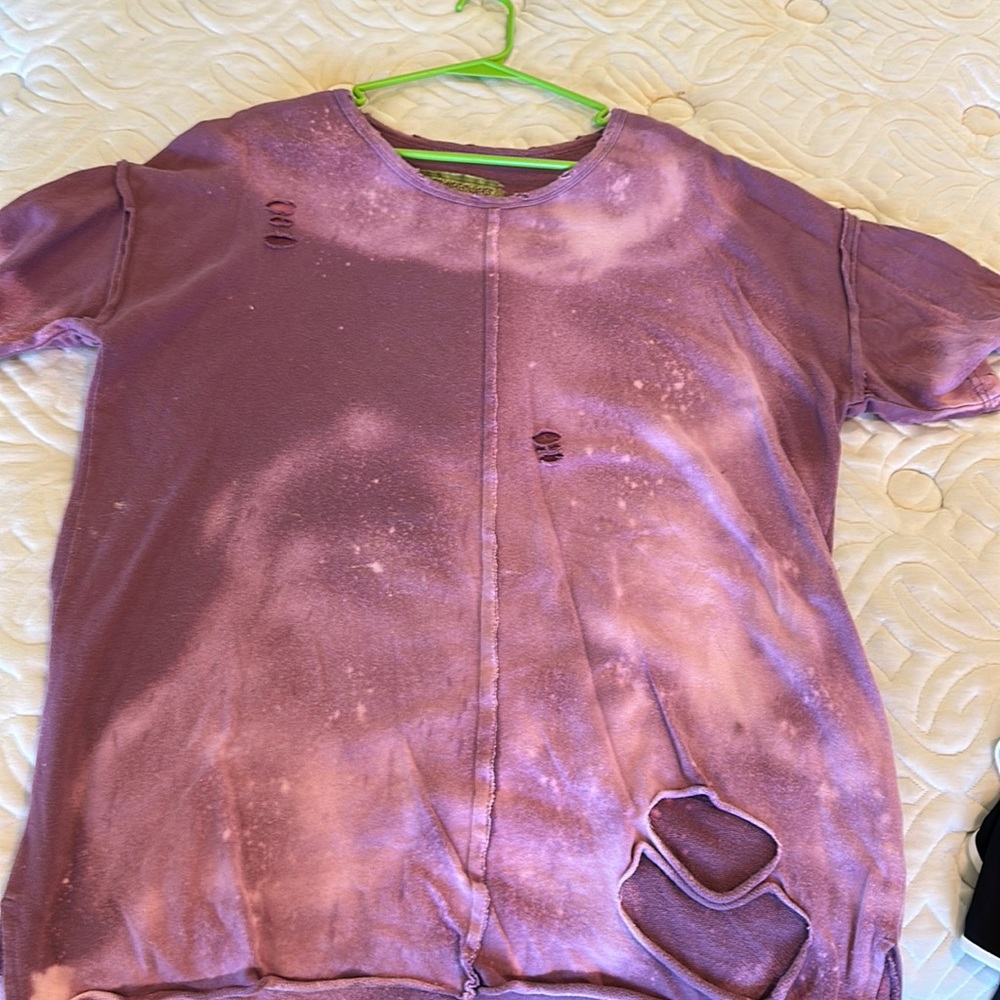 Cute intentionally distressed sweatshirt fits like a large